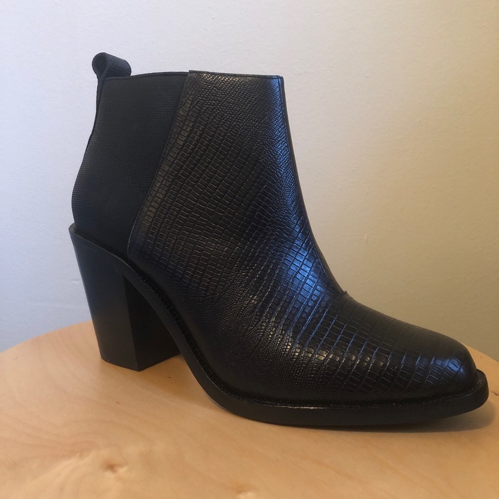 Black ankle booties. New in box